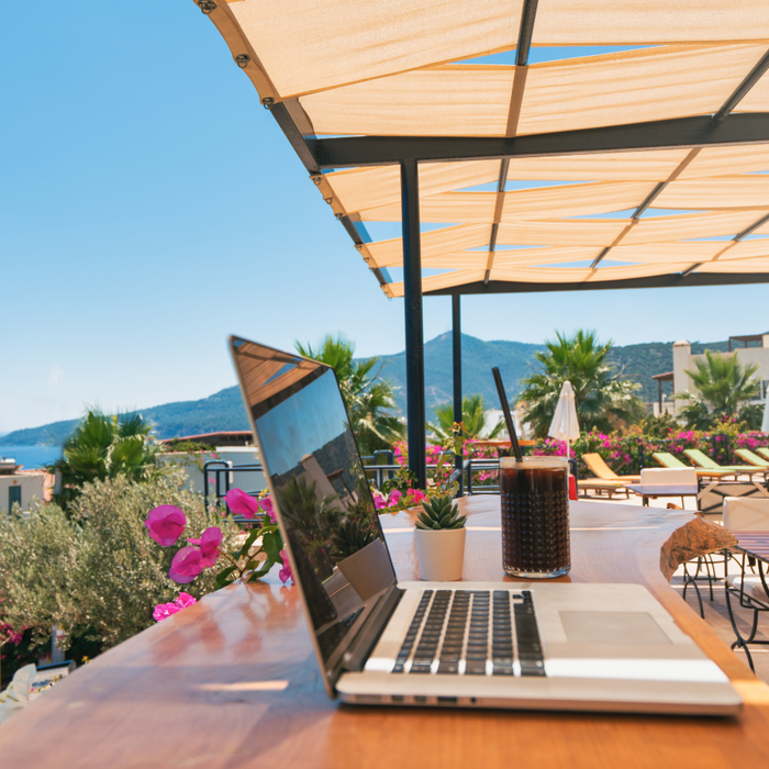 Laptop on a table - working on vacation